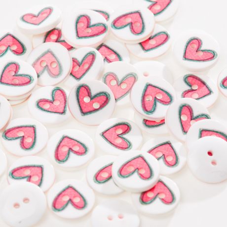 Bouton coeur � trous