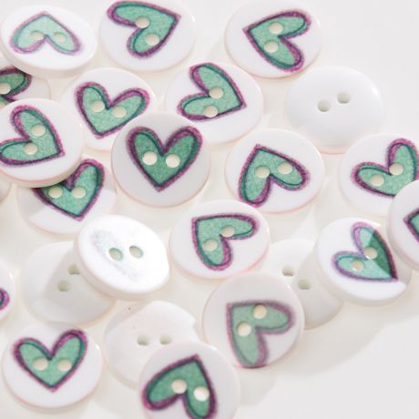 Bouton coeur � trous