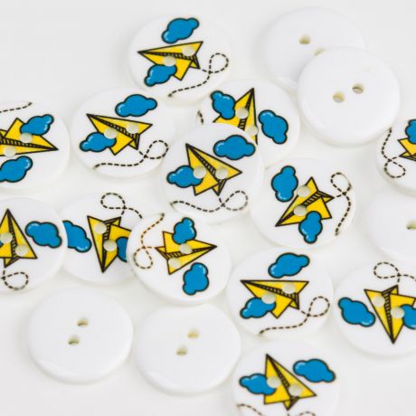Bouton enfant avion en papier