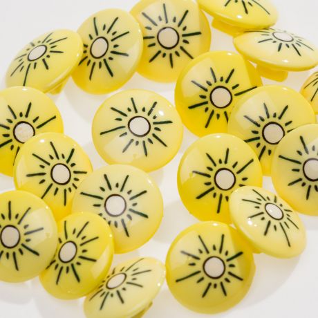 Bouton soleil � queue