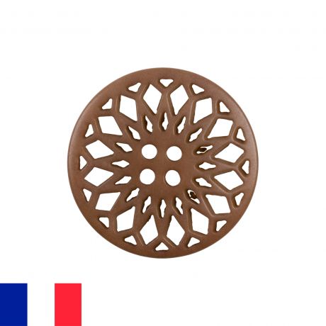 Bouton rosace ajour�e � trous