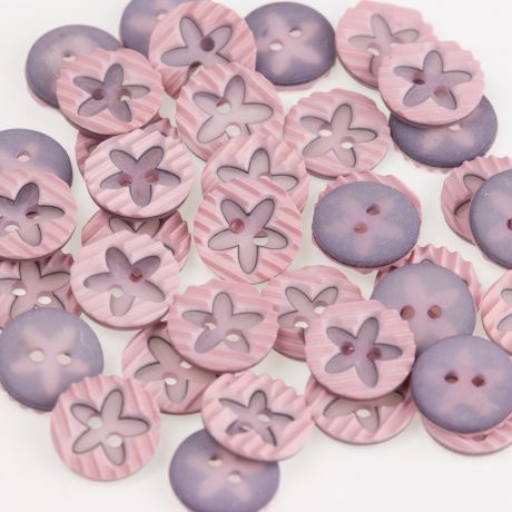 Bouton �toile � trous