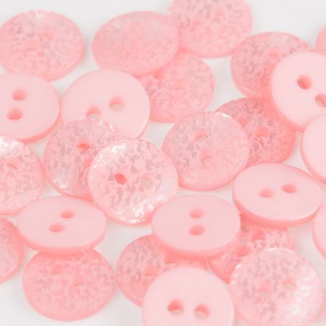 Bouton grav� � trous