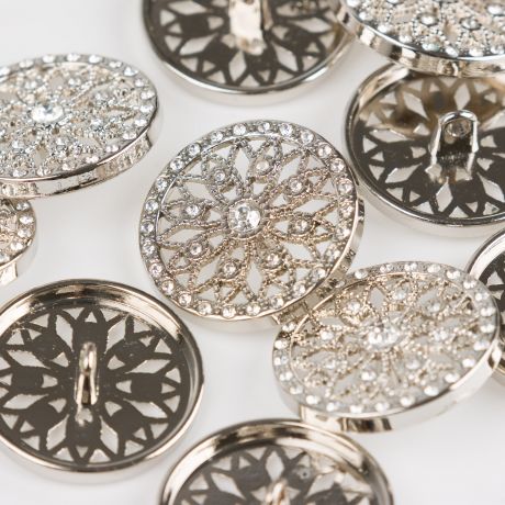 Bouton strass à queue