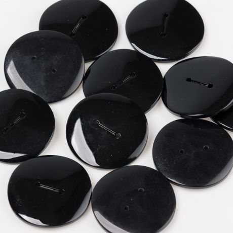 Bouton brillant surface vague  trous