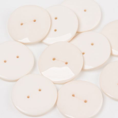 Bouton brillant surface vague  trous