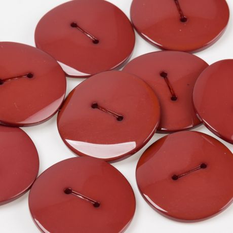 Bouton brillant surface vague  trous