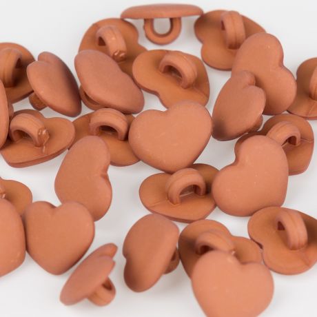 Bouton cœur à queue