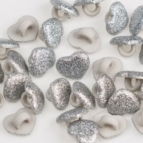 Bouton coeur argent� � queue