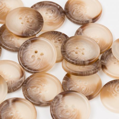 Bouton marbr� � trous